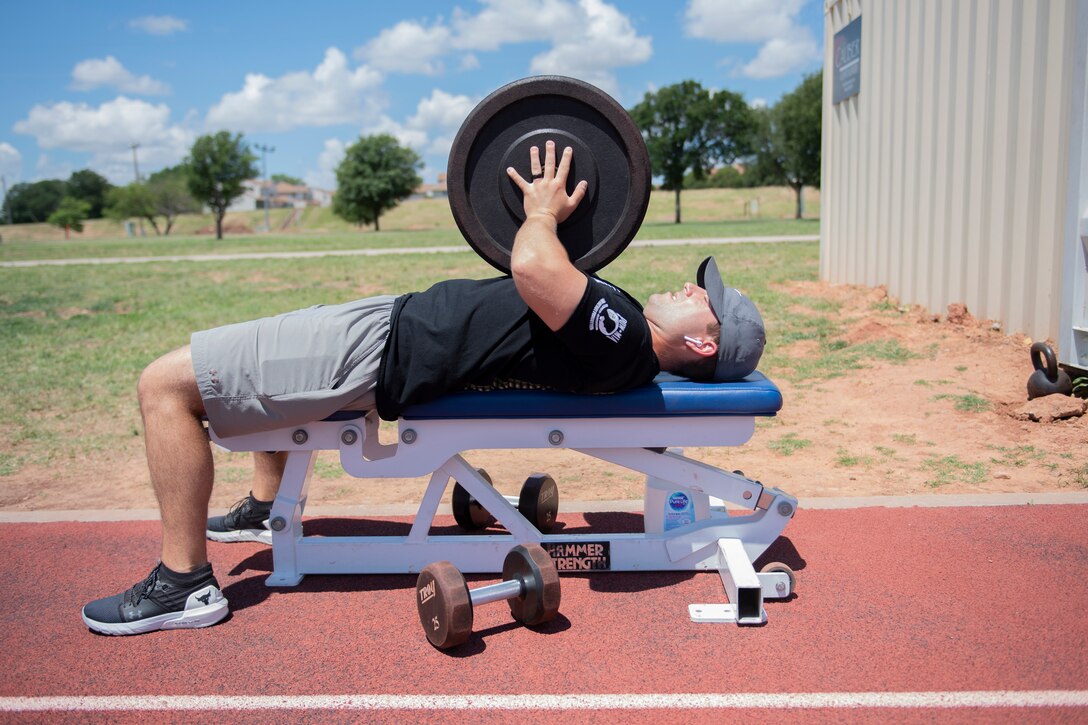 An airman works out at a fitness pod