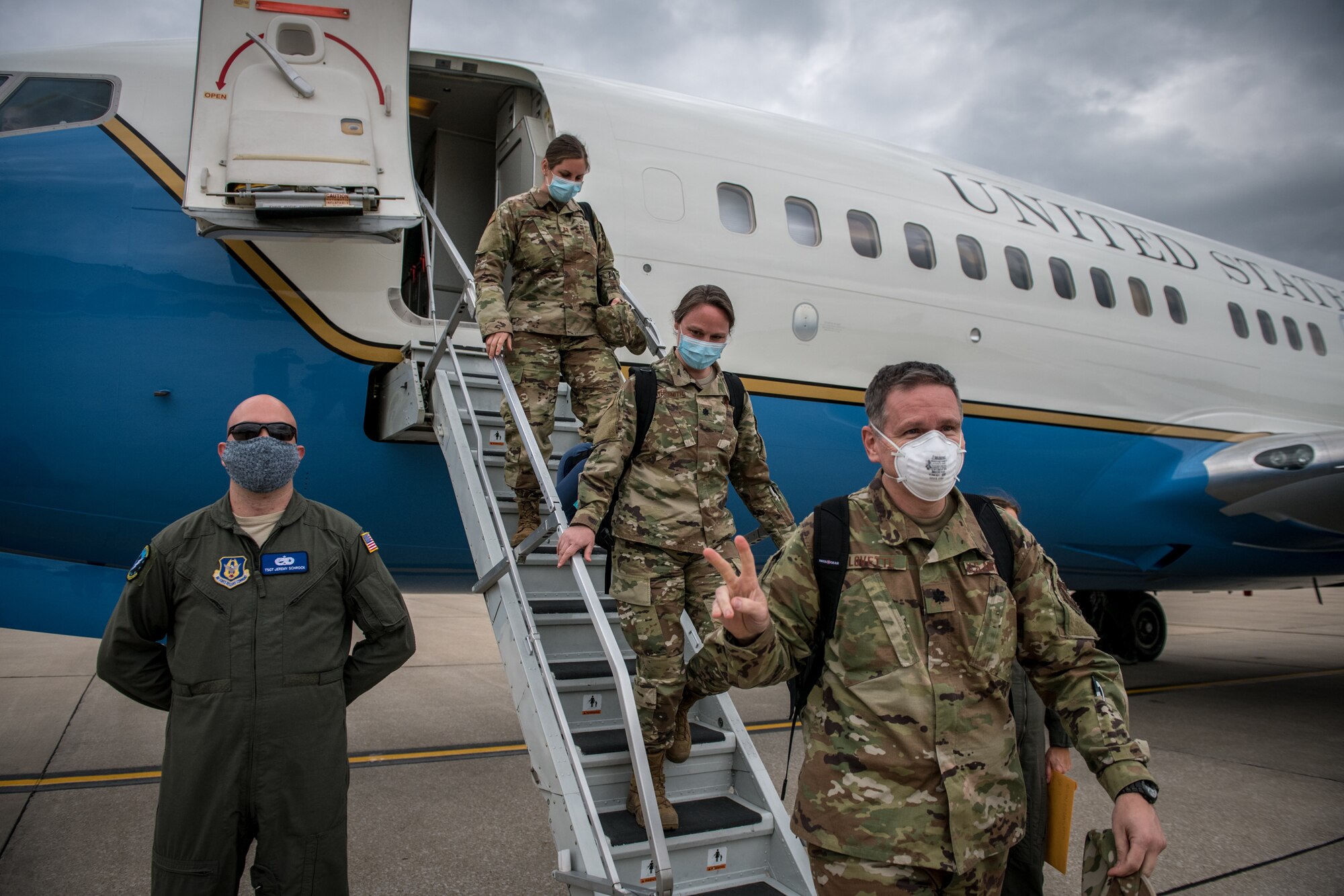 Citizen Airmen from the 932nd Medical Group return home to Scott Air Force Base in late May and early June. The medical reservists departed together to serve on the front line of COVID-19 to support various hospitals in the New England areas in late April, 2020. Wing and Medical Group leadership welcomed them back and presented them with a Wing coin for their outstanding contributions to the fight against the Coronavirus. (U.S. Air Force photo by Christopher Parr)