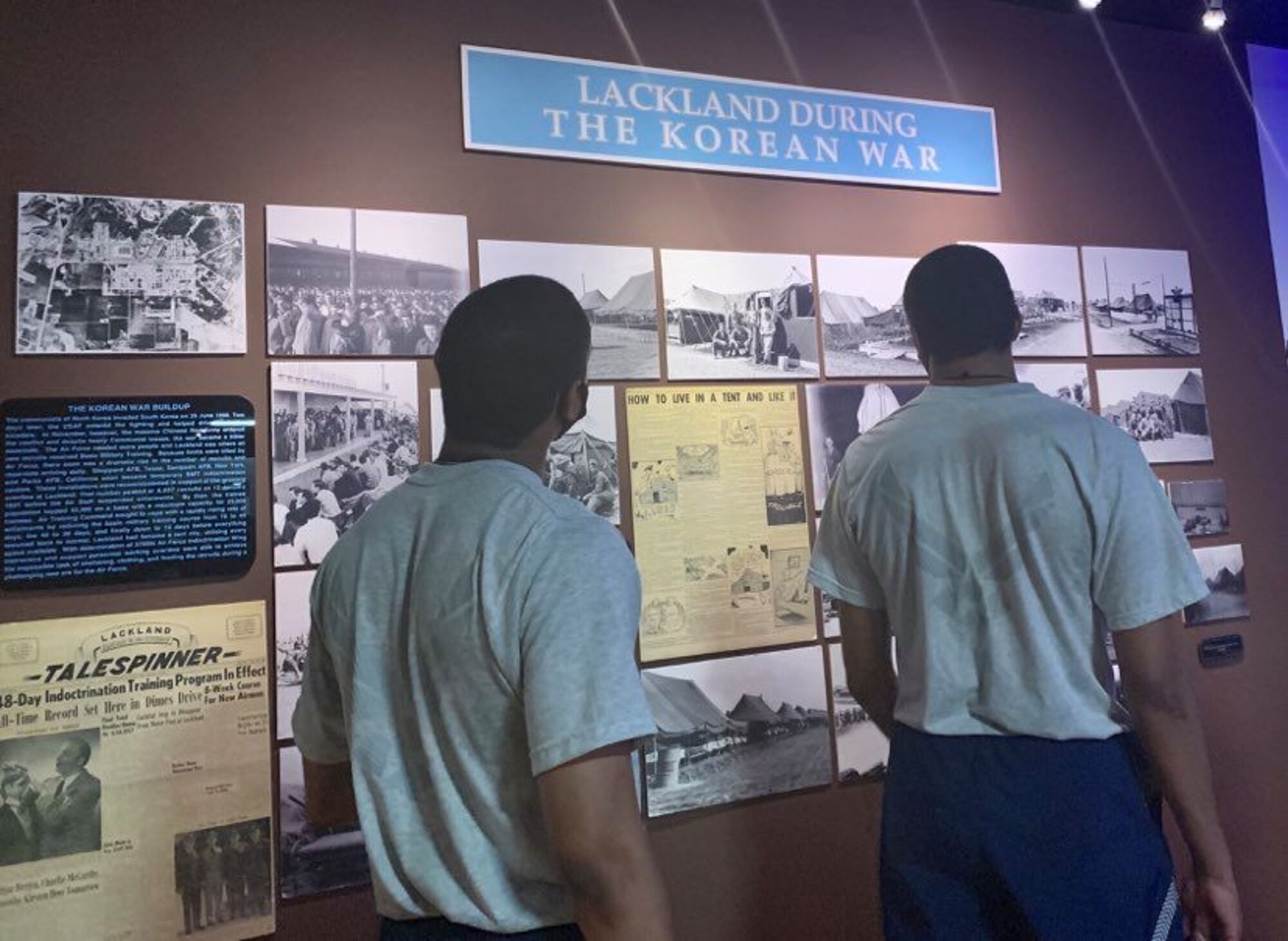 Photo of basic military training trainees viewing Airman Heritage Museum exhibits.