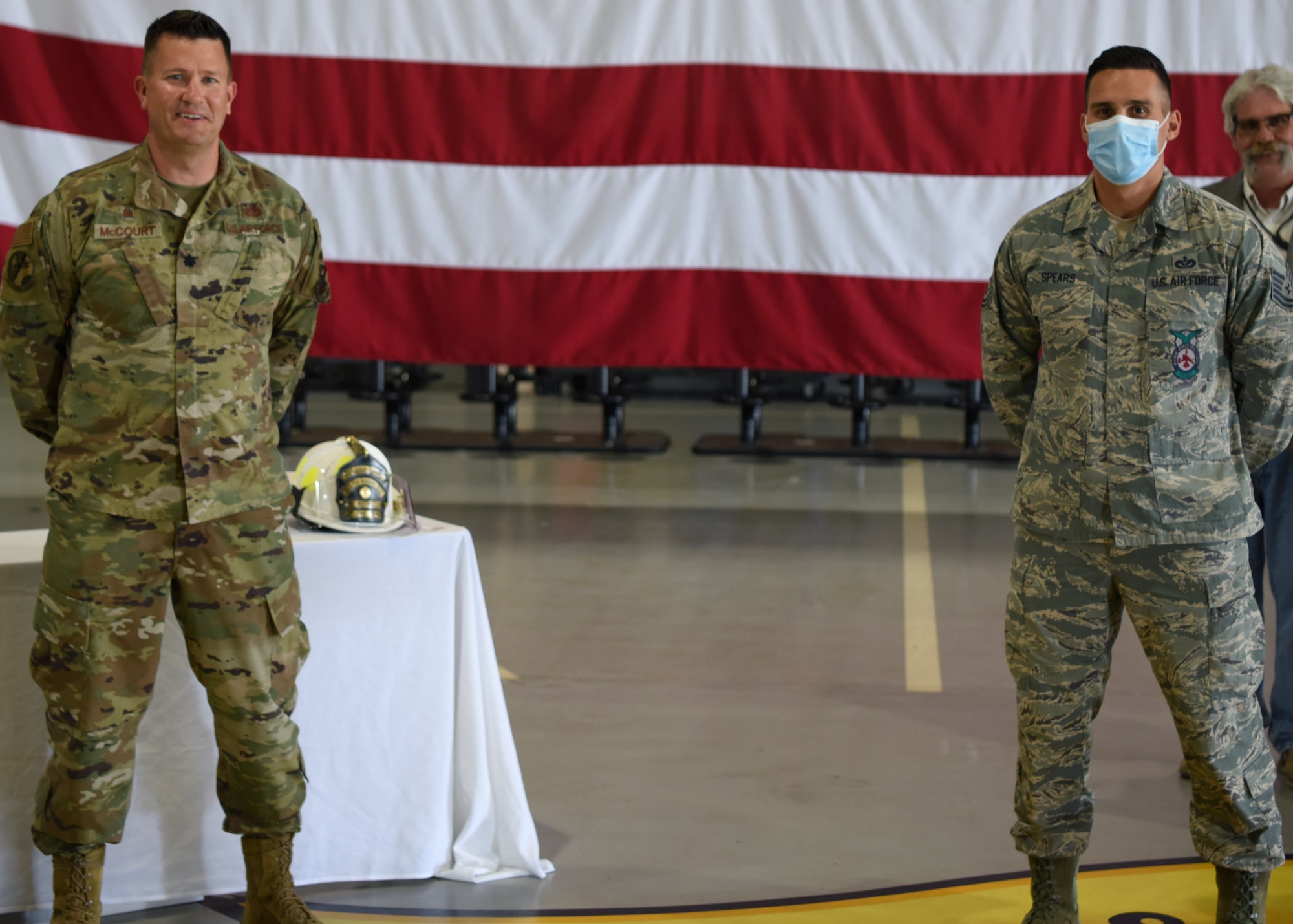 U.S. Air Force Lt. Col. Michael McCourt, 312th Training Squadron commander, poses with Tech. Sgt. Alexander Spears, 312th TRS fire instructor, who won the Department of Defense Fire Academy U.S. Air Force Instructor of the Year Award at the Louis F. Garland DoD Fire Academy on Goodfellow Air Force Base, Texas, June 5, 2020. All DoD firefighters are trained in a joint service environment. (U.S. Air Force photo by Airman 1st Class Ethan Sherwood)