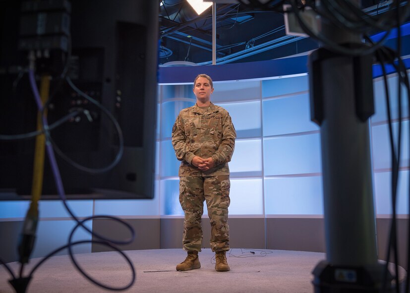 Tech. Sgt. Renee Wiederspahn, a Lankford Enlisted Professional Military Education professional military training instructor, prepares to read from a teleprompter at the TEC television studios in East Tennessee, June 4, 2020, during a recording session for virtual in-residence enlisted education. The center kicks off virtual-in-residence-remote Noncomissioned Officer Academy and Airman Leadership School for the Air Force this month. (U.S. Air National Guard photo by Master Sgt. Mike R. Smith)