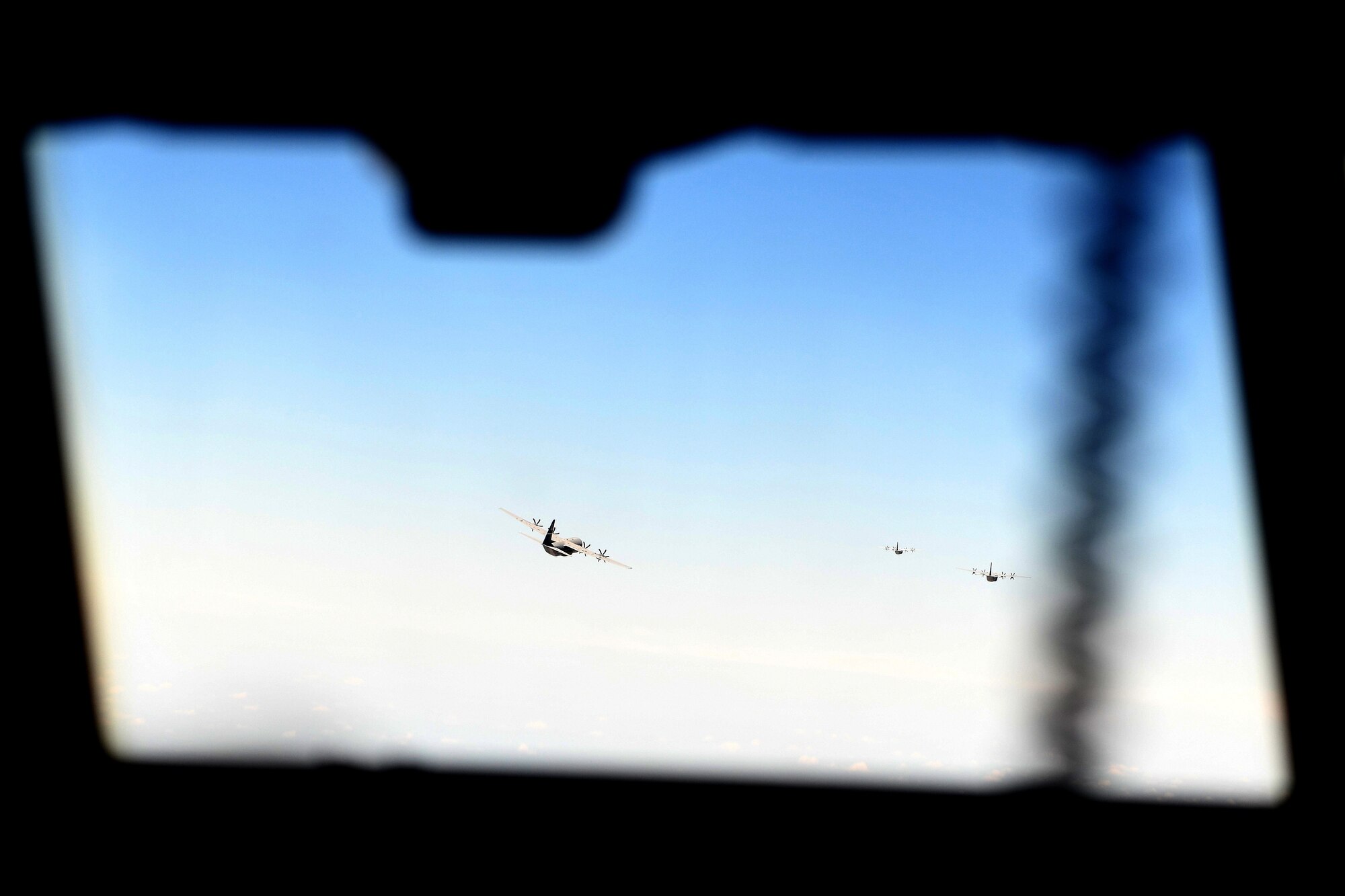 C-130J Super Hercules from Little Rock Air Force Base, Arkansas, fly in formation during a Joint Forcible Entry exercise near Las Vegas, June 6, 2020. More than 20 C-130Js and C-17 Globemaster IIIs flew in formation during the U.S. Air Force Weapons School’s Joint Forcible Entry exercise with numerous other aircraft from across the Air Force. (U.S. Air Force photo by Senior Airman Kristine M. Gruwell)