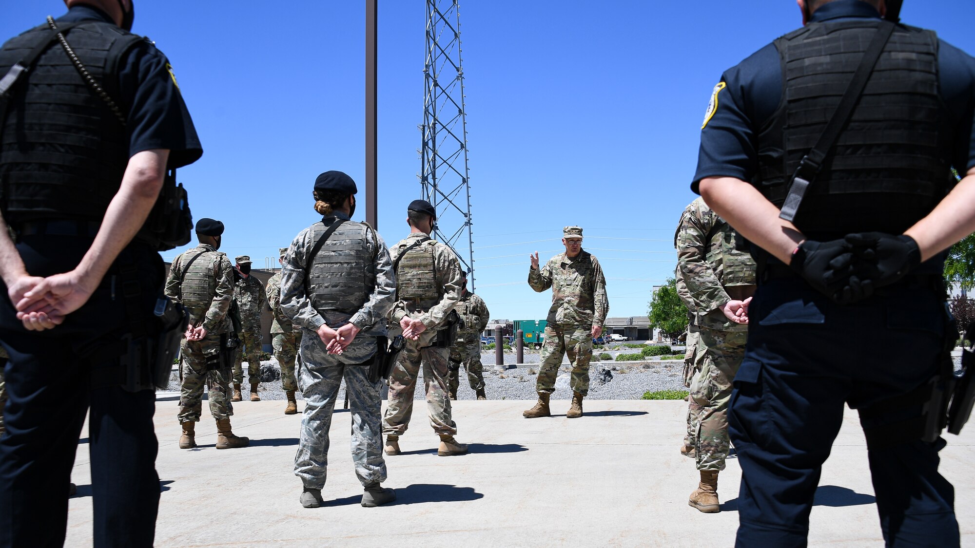 Gen. Bunch is addressing Airmen in formation from the 75th Security Forces Squadron.