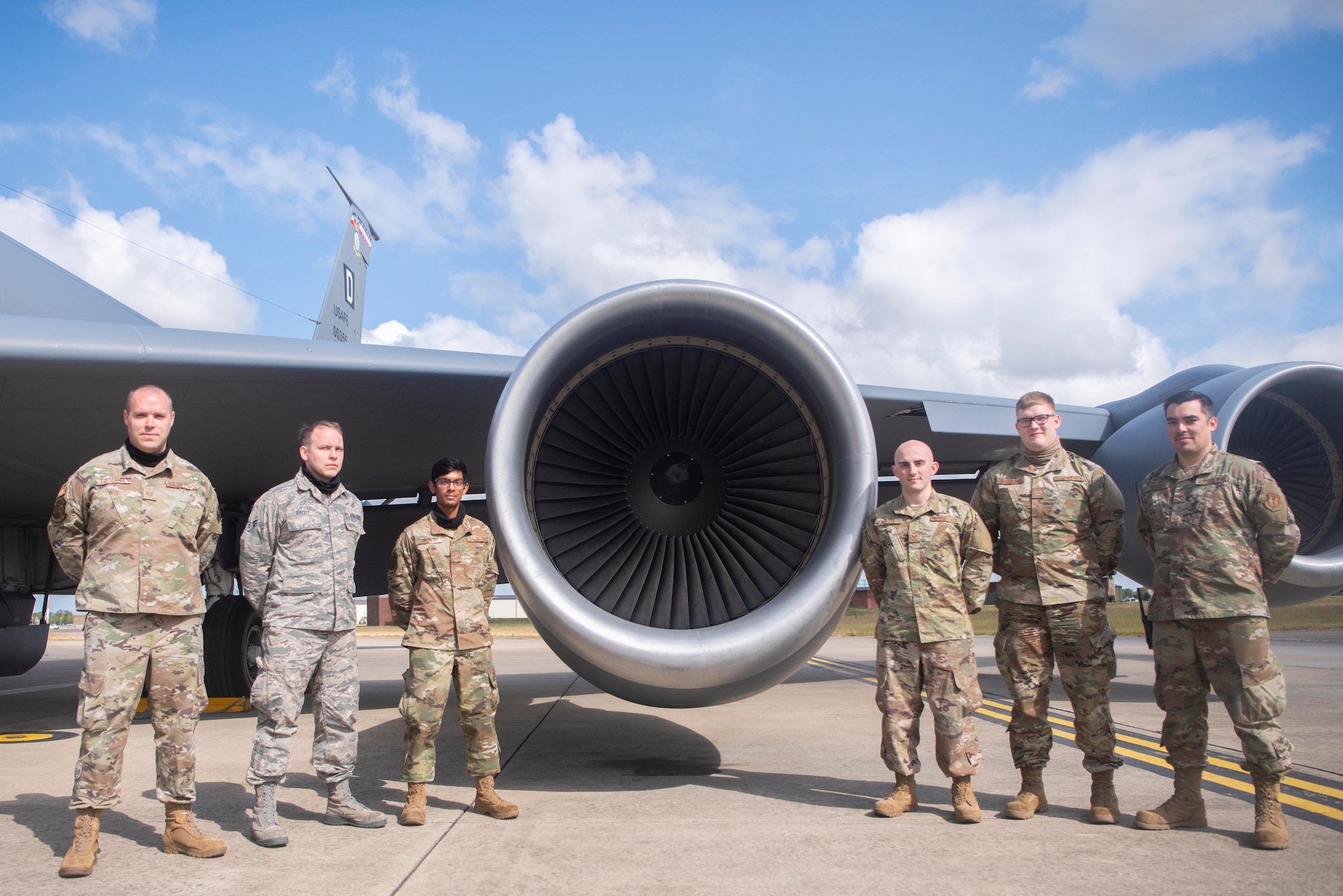 Members of the 100th Aircraft Maintenance Squadron Jet Shop pose for a photo in front of a KC-135 Stratotanker F108 turbofan engine at RAF Mildenhall, England, June 9, 2020. The shop maintains all KC-135 engines on base, supporting the wing in strategic aerial refueling objectives. (U.S. Air Force photo by Airman 1st Class Joseph Barron)