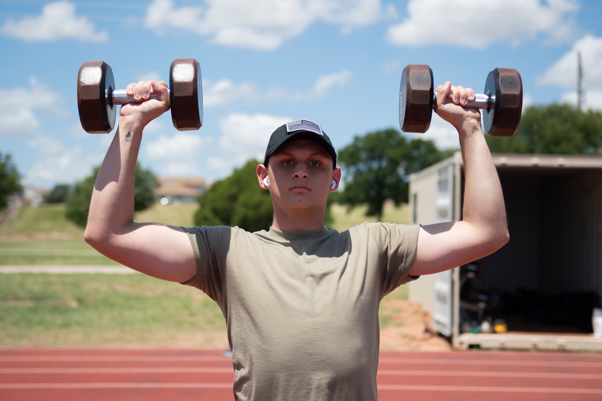 An Airman works out at a fitness pod