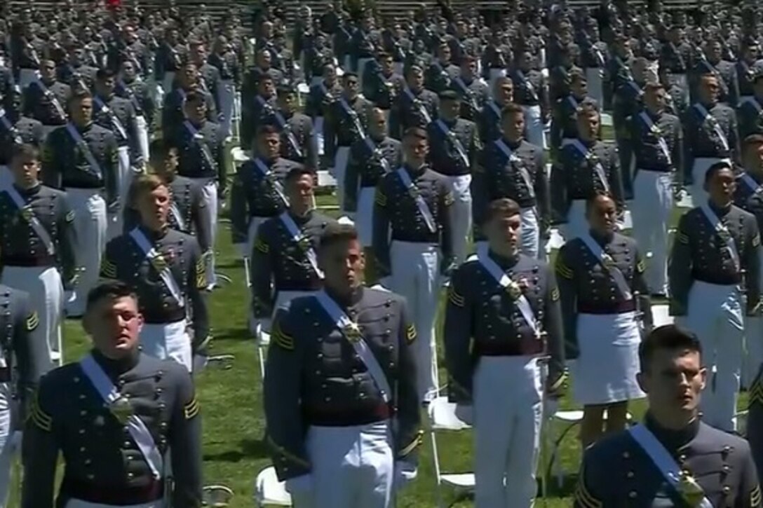 Cadets stand at attention.