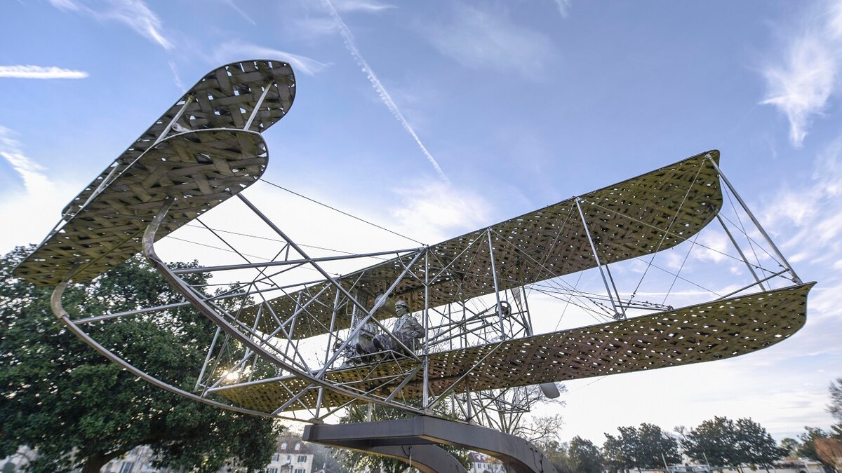 The Wright Flyer statue sits on display February 3, 2020, at Maxwell Air Force Base, Alabama. The aircraft and statues on display showcase the history of Maxwell AFB and Air University. (U.S. Air Force photo by Staff Sgt. Quay Drawdy)