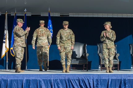 Lt. Gen. Brad Webb, the Air Education and Training Command commander (left), and Brig. Gen. Laura Lenderman, the former 502d Air Base Wing and Joint Base San Antonio commander (right), congratulate Brig. Gen. Caroline Miller, the wing's newest commander, during a change of command ceremony June 12 at JBSA-Fort Sam Houston.