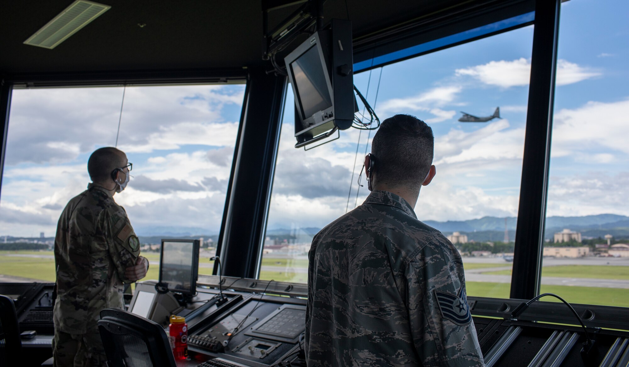 Tech. Sgt. Gregory Nitch and Staff Sgt. Grant Krause, both with the 374th Operations Support Squadron air traffic controllers,