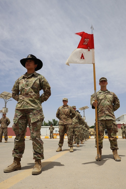 U.S. Army Soldiers from the 1st Squadron, 303rd Cavalry Regiment (1-303 CAV), Washington Army National Guard, stand in formation during the transfer of authority ceremony