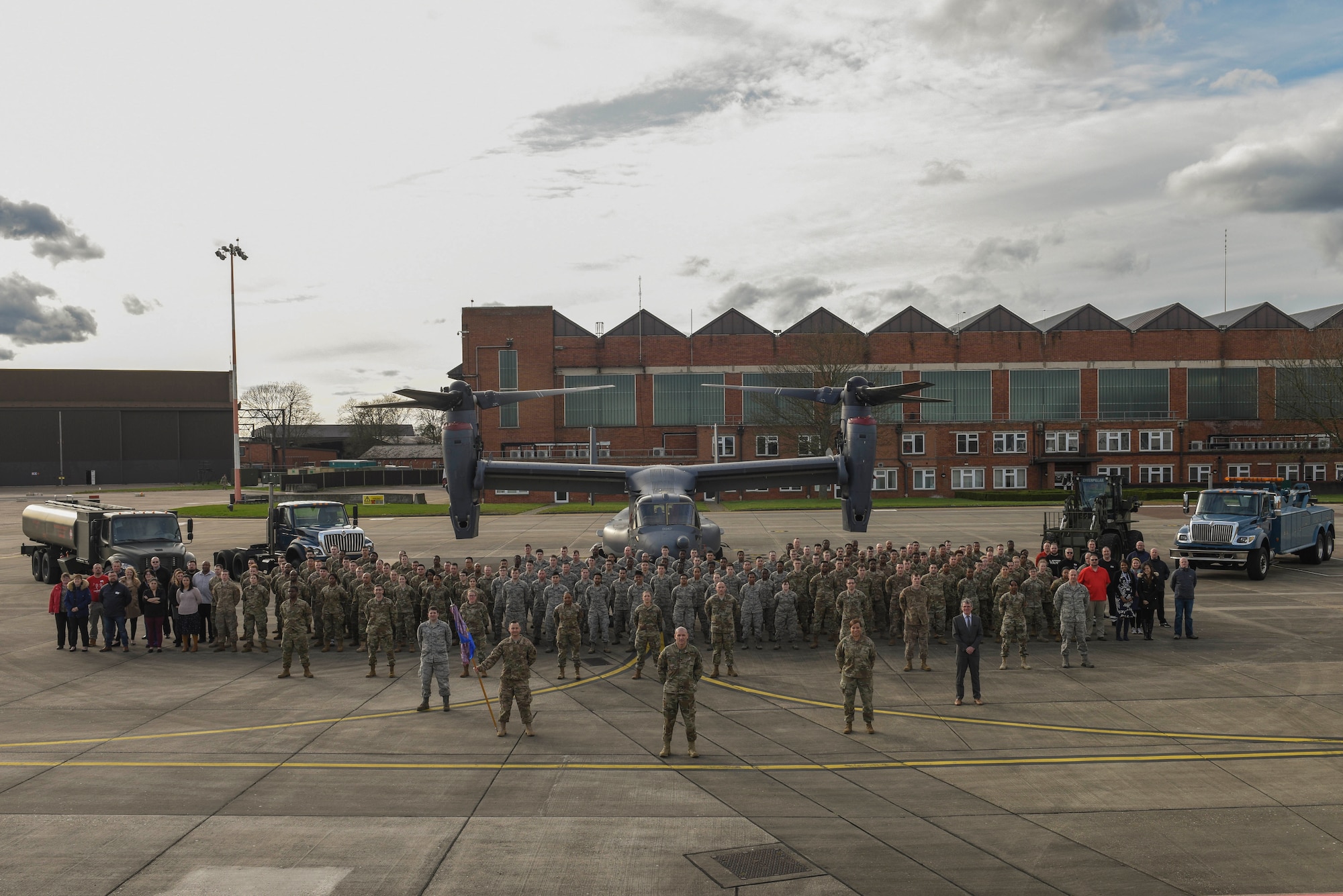 Airmen of the 100th Logistics Readiness Squadron pose for a squadron photo at RAF Mildenhall, England, March 11, 2020. The 100th LRS was awarded the Major General Warren R. Carter Logistics Readiness Award Daedalian trophy for United States Air Forces in Europe - Air Forces Africa. (U.S. Air Force photo by Staff Sgt. Luke Milano)