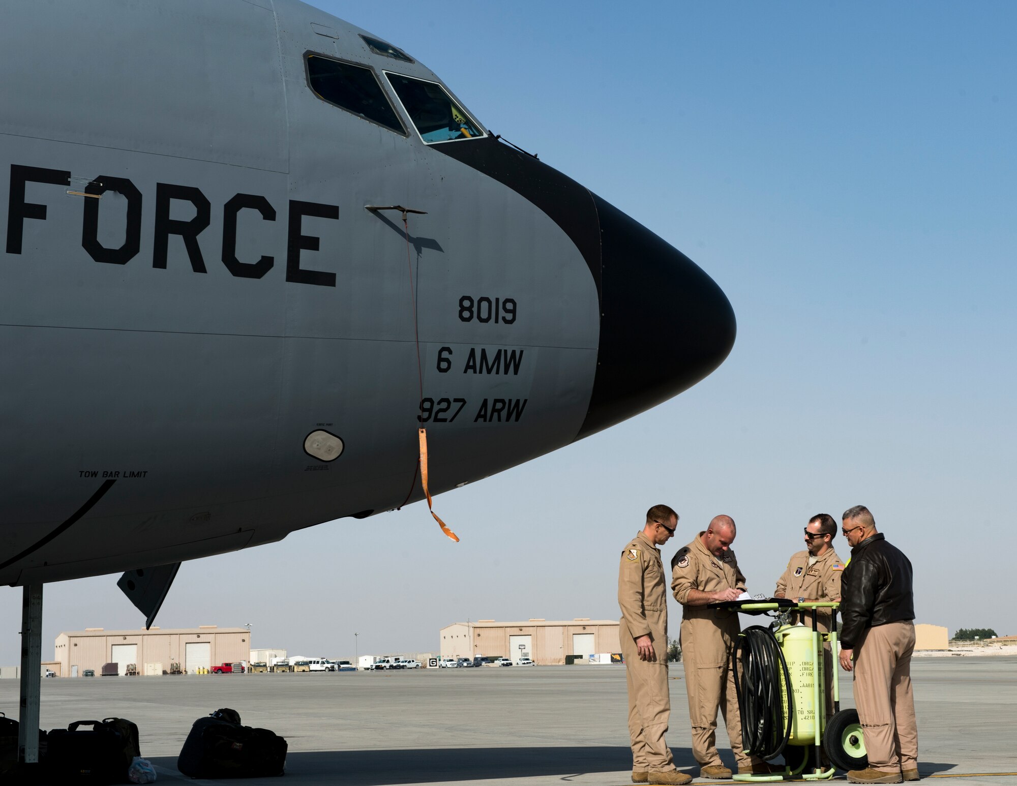 U.S. Air Force Airmen assigned to the 28th Expeditionary Air Refueling Squadron conduct a preflight briefing at Al Udeid Air Base, Qatar, Feb. 5, 2020.