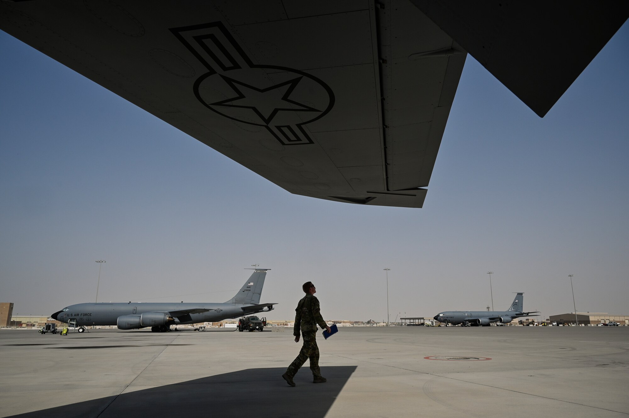 A U.S. Air Force KC-135 Stratotanker aircraft commander with the 28th Expeditionary Air Refueling Squadron assigned to Al Udeid Air Base, Qatar, conducts a preflight walk-around inspection at Al Udeid AB, May 21, 2020.