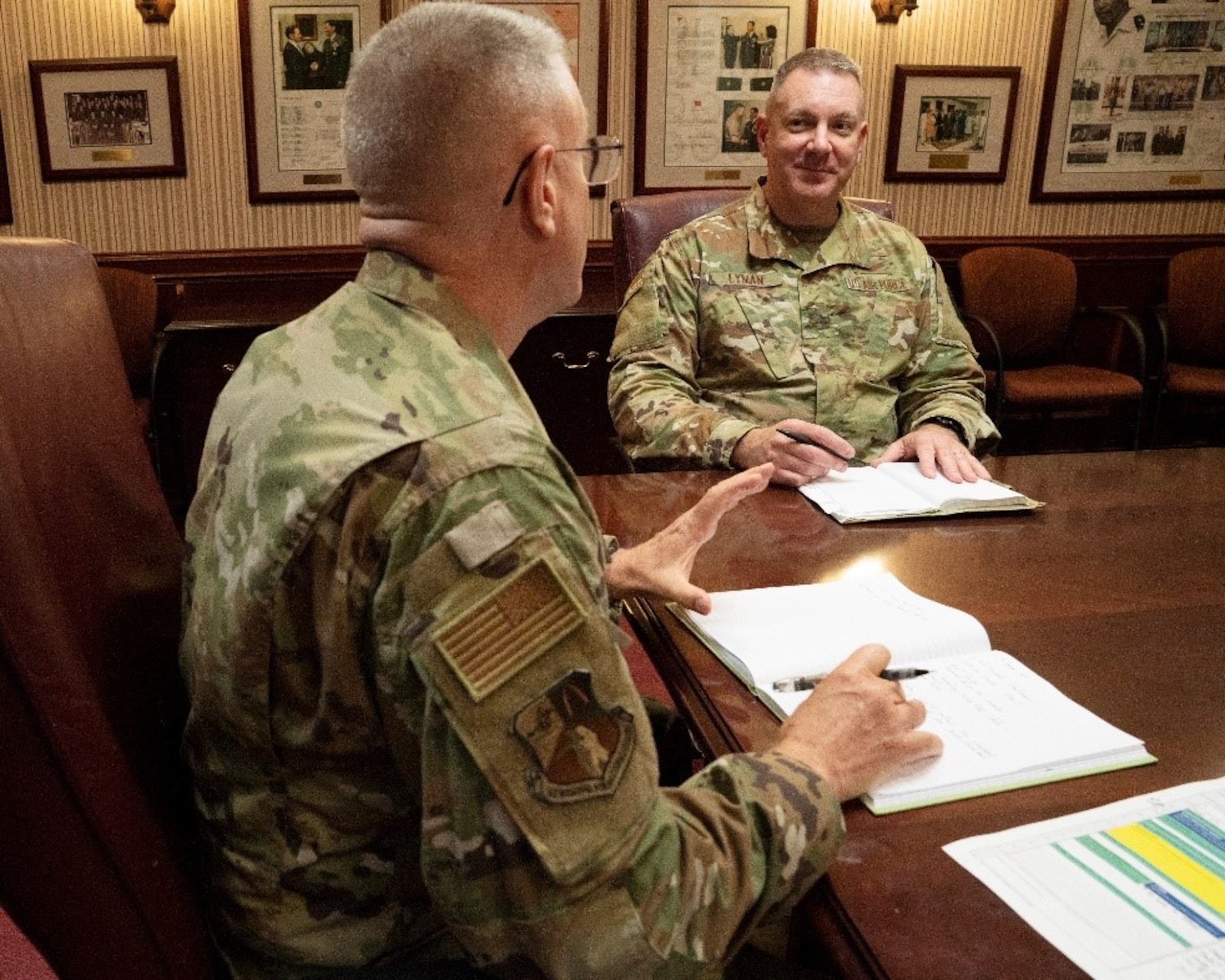 U.S. Air Force Brig. Gen. Robert Lyman, director, Command, Control, Communications, and Cyber Systems Directorate, TCJ6, pictured center, meets with U.S. Air Force Col. Mark Bradley, TCJ6 deputy director, on Tuesday, June 9.