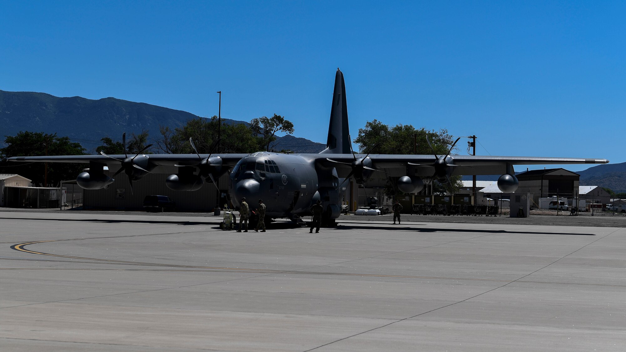 Airmen perform a pre-flight inspection.