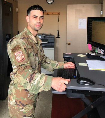 U.S. Air Force Master Sgt. Michael Teixeira, 439th Aircraft Maintenance Squadron NCOIC, works on administrative duties at Westover Air Reserve Base, Massachusetts. Teixeira ensures AMXS personnel are trained and follow proper procedure. (Courtesy photo)