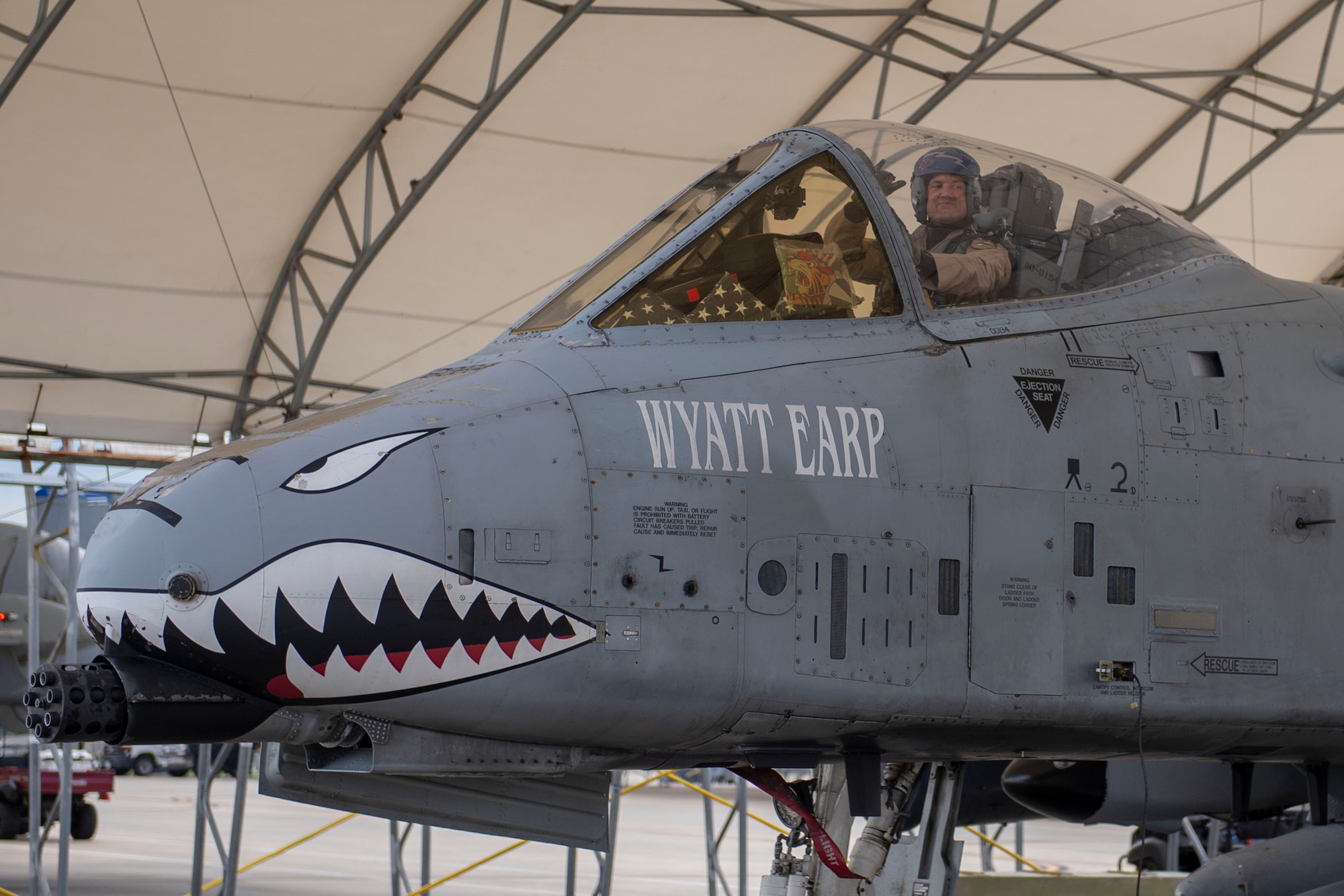 Lt. Col. Michael Sackenheim, 74th Expeditionary Fighter Squadron commander, waves to onlookers from the cockpit of an A-10C Thunderbolt II after returning from a 5-month deployment June 10, 2020, at Moody Air Force Base, Georgia. Approximately 300 members assigned to the 74th EFS returned from deployment June 10-12. The 74th EFS, which consisted of personnel from the 23d Fighter Group and 23d Maintenance Group, were deployed as a part of Operation Freedom Sentinel. (U.S. Air Force photo by 2nd Lt. Kaylin P. Hankerson)