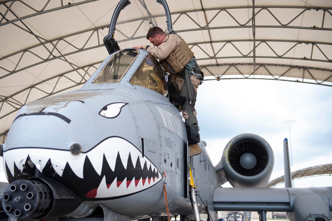 Lt. Col. Michael Sackenheim, 74th Expeditionary Fighter Squadron commander, climbs out of an A-10C Thunderbolt II after returning to home-station after a 5-month deployment June 10, 2020, at Moody Air Force Base, Georgia. Approximately 300 members assigned to the 74th EFS returned from deployment June 10-12. The 74th EFS, which consisted of personnel from the 23d Fighter Group and 23d Maintenance Group, were deployed as a part of Operation Freedom Sentinel. (U.S. Air Force photo by 2nd Lt. Kaylin P. Hankerson)