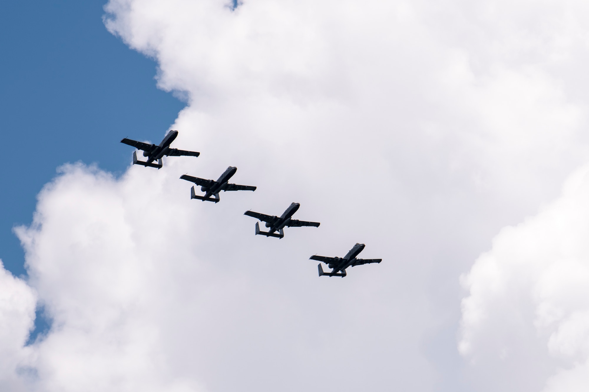 A-10C Thunderbolt IIs assigned to the 74th Expeditionary Fighter Squadron fly over the flightline June 10, 2020, at Moody Air Force Base, Georgia. Approximately 300 members assigned to the 74th EFS returned from deployment June 10-12. The 74th EFS, which consisted of personnel from the 23d Fighter Group and 23d Maintenance Group, were deployed as a part of Operation Freedom Sentinel. (U.S. Air Force photo by 2nd Lt. Kaylin P. Hankerson)