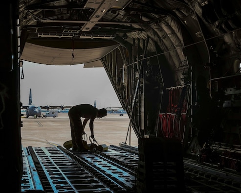A U.S. Air Force loadmaster prepares a C-130J Super Hercules from Little Rock Air Force Base, Arkansas, for flight during a Joint Forcible Entry exercise near Las Vegas, June 6, 2020. More than 20 C-130Js and C-17 Globemaster IIIs flew in formation during the U.S. Air Force Weapons School’s Joint Forcible Entry exercise with numerous other aircraft from across the Air Force. (U.S. Air Force photo by Senior Airman Kristine M. Gruwell)