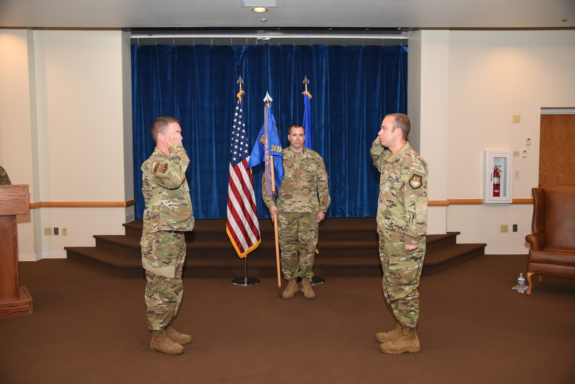 Lieutenant Colonel Mack salutes Colonel Ewers