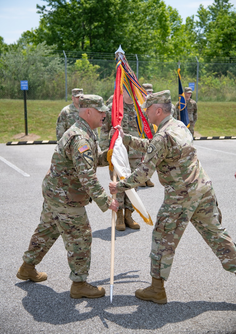 Lt. Col. Robert J. Kincaid recieves the command guideon from Brig. Gen. Russell Crane, Assistant Adjutant General, as he assumes command of the West Virginia National Guard's 111th Engineer Brigade in Eleanor, Saturday, June 13, 2020. The ceremony was held outdoors with family and friends in attendance. (U.S. Army National Guard photo by Edwin L. Wriston)