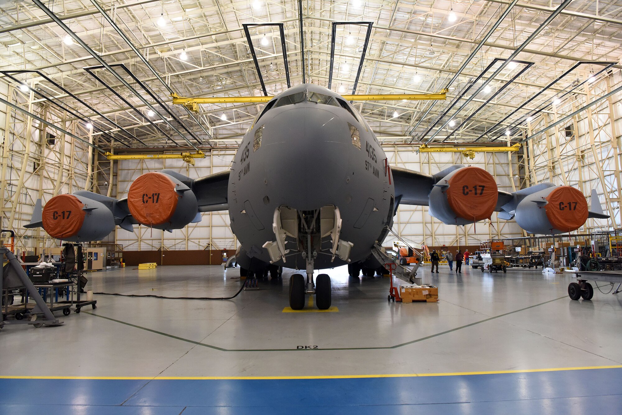 Aircraft shows a C-17 aircraft sitting in a hangar.