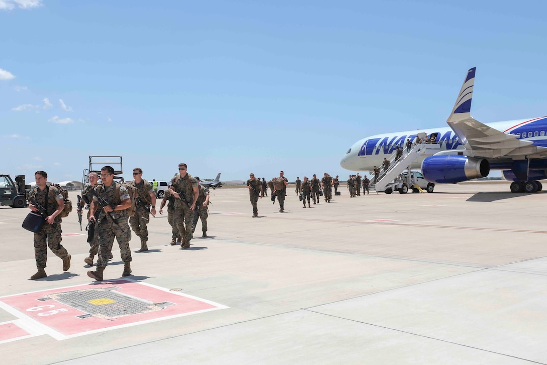 U.S. Marines with Special Purpose Marine Air-Ground Task Force-Crisis Response-Africa 20.2, Marine Forces Europe and Africa, arrive at Móron Air Base, Spain on June 9, 2020. SPMAGTF-CR-AF 20.2 is deployed to conduct crisis-response and theater-security operations in Africa and promote regional stability by conducting military-to-military training exercises throughout Europe and Africa. SPMAGTF-CR-AF 20.2 continues to work closely with the relevant medical agencies and military organizations to minimize risk of COVID-19 exposure. (U.S. Marine Corps photo by Cpl. Tawanya Norwood)