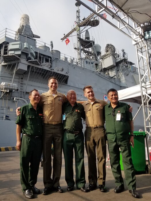 Maj Casey and Capt Grant, Southeast Asia FAOs support U.S. and Vietnamese veterans exchange event during the USS Theodore Roosevelt Carrier Strike Group visit to Danang, Vietnam.