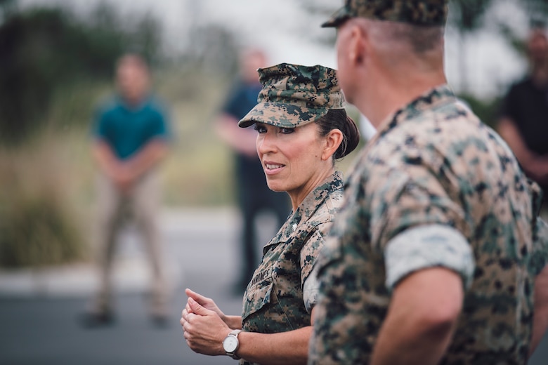 U.S. Marine Corps Lt. Col. Juliet Calvin, center, the commanding officer of 1st Network Battalion, Marine Corps Cyberspace Operations Group, speaks to Marines and civilians during the battalion transfer of authority at Marine Corps Base Camp Pendleton, California, June 4, 2020. 1st Network Bn., the first of six new Marine Corps network units, was created to improve oversight, command, and control of the Marine Corps enterprise network while managing building and local area networks around base. (U.S. Marine Corps photo by Staff Sgt. Donald Holbert)