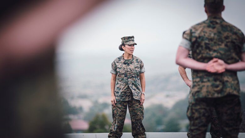 U.S. Marine Corps Lt. Col. Juliet Calvin, the commanding officer of 1st Network Battalion, Marine Corps Cyberspace Operations Group, speaks to Marines and civilians during the battalion transfer of authority at Marine Corps Base Camp Pendleton, California, June 4, 2020. 1st Network Bn., the first of six new Marine Corps network units, was created to improve oversight, command, and control of the Marine Corps enterprise network while managing building and local area networks around base. (U.S. Marine Corps photo by Staff Sgt. Donald Holbert)