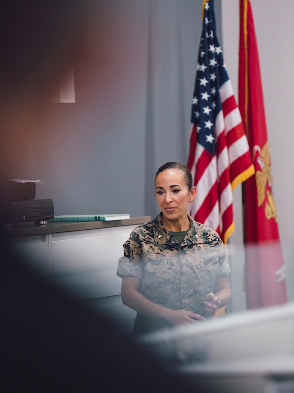 U.S. Marine Corps Lt. Col. Juliet Calvin, the commanding officer of 1st Network Battalion, Marine Corps Cyberspace Operations Group, conducts a walkthrough of the battalion workspaces at Marine Corps Base Camp Pendleton, California, June 4, 2020. 1st Network Bn., the first of six new Marine Corps network units, was created to improve oversight, command, and control of the Marine Corps enterprise network while managing building and local area networks around base. (U.S. Marine Corps photo by Staff Sgt. Donald Holbert)