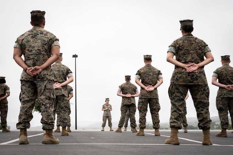 U.S. Marine Corps Lt. Col. Juliet Calvin, center, the commanding officer of 1st Network Battalion, Marine Corps Cyberspace Operations Group, speaks to Marines during the battalion transfer of authority at Marine Corps Base Camp Pendleton, California, June 4, 2020. 1st Network Network Bn., the first of six new Marine Corps network units, was created to improve oversight, command, and control of the Marine Corps enterprise network while managing building and local area networks around base. (U.S. Marine Corps photo by Cpl. Dalton S. Swanbeck)