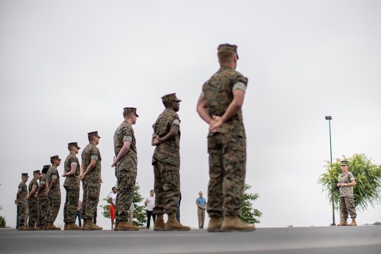 U.S. Marine Corps Lt. Col. Juliet Calvin, right, the commanding officer of 1st Network Battalion, Marine Corps Cyberspace Operations Group, speaks to Marines during the battalion transfer of authority at Marine Corps Base Camp Pendleton, California, June 4, 2020. 1st Network Bn., the first of six new Marine Corps network units, was created to improve oversight, command, and control of the Marine Corps enterprise network while managing building and local area networks around base. (U.S. Marine Corps photo by Cpl. Dalton S. Swanbeck)