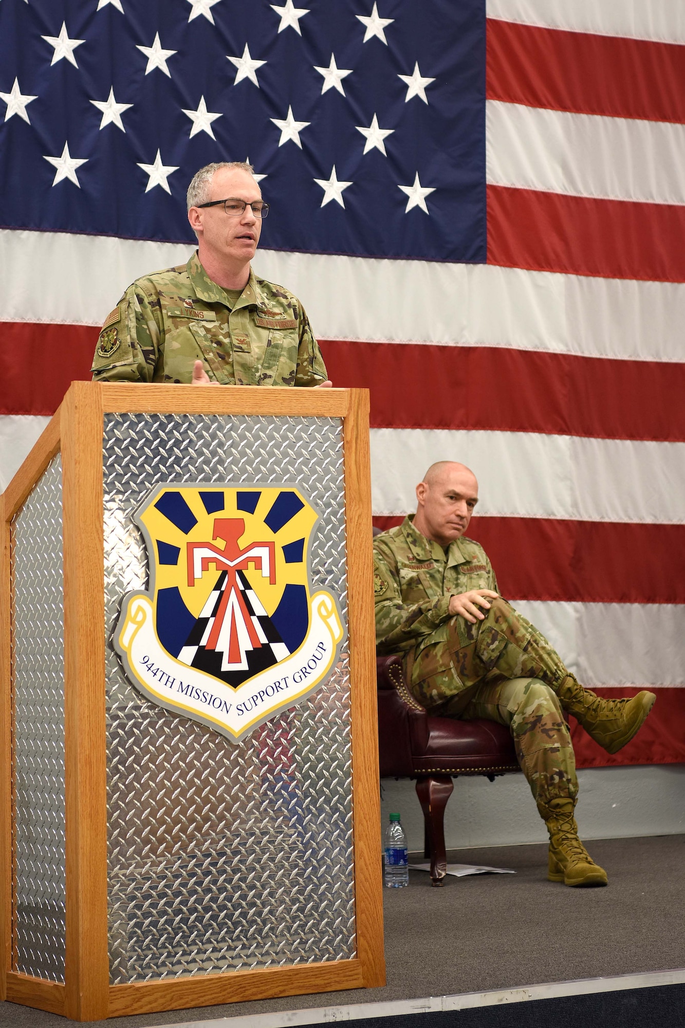 Col. Jim Greenwald, 944th Fighter Wing commander, gives command of the 944th MSG to Col. Rodney Lykins in front fellow commanders and peers.