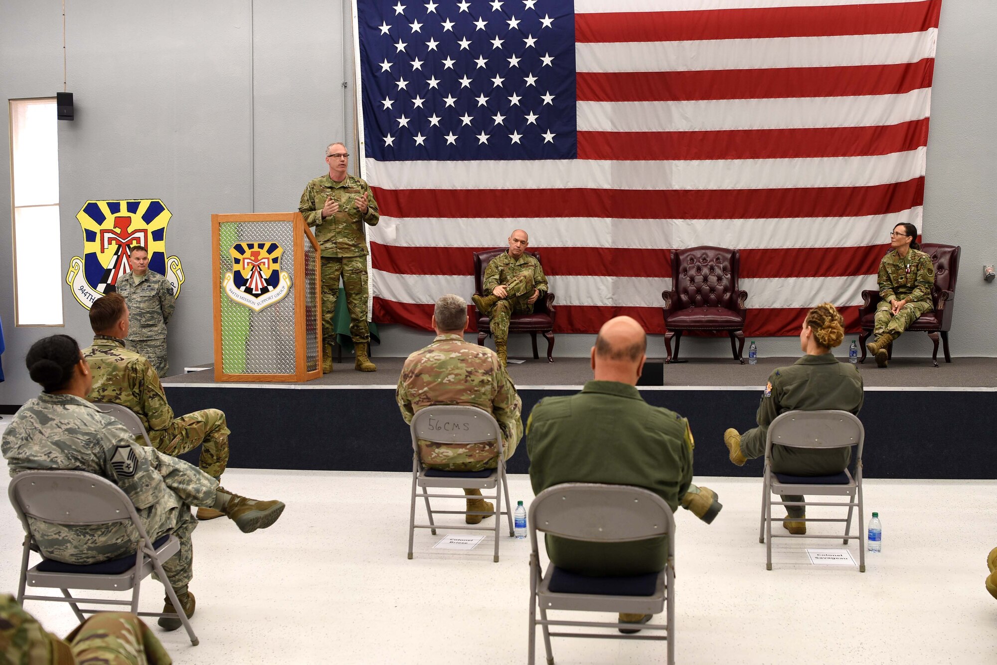 Col. Jim Greenwald, 944th Fighter Wing commander, gives command of the 944th MSG to Col. Rodney Lykins in front fellow commanders and peers.