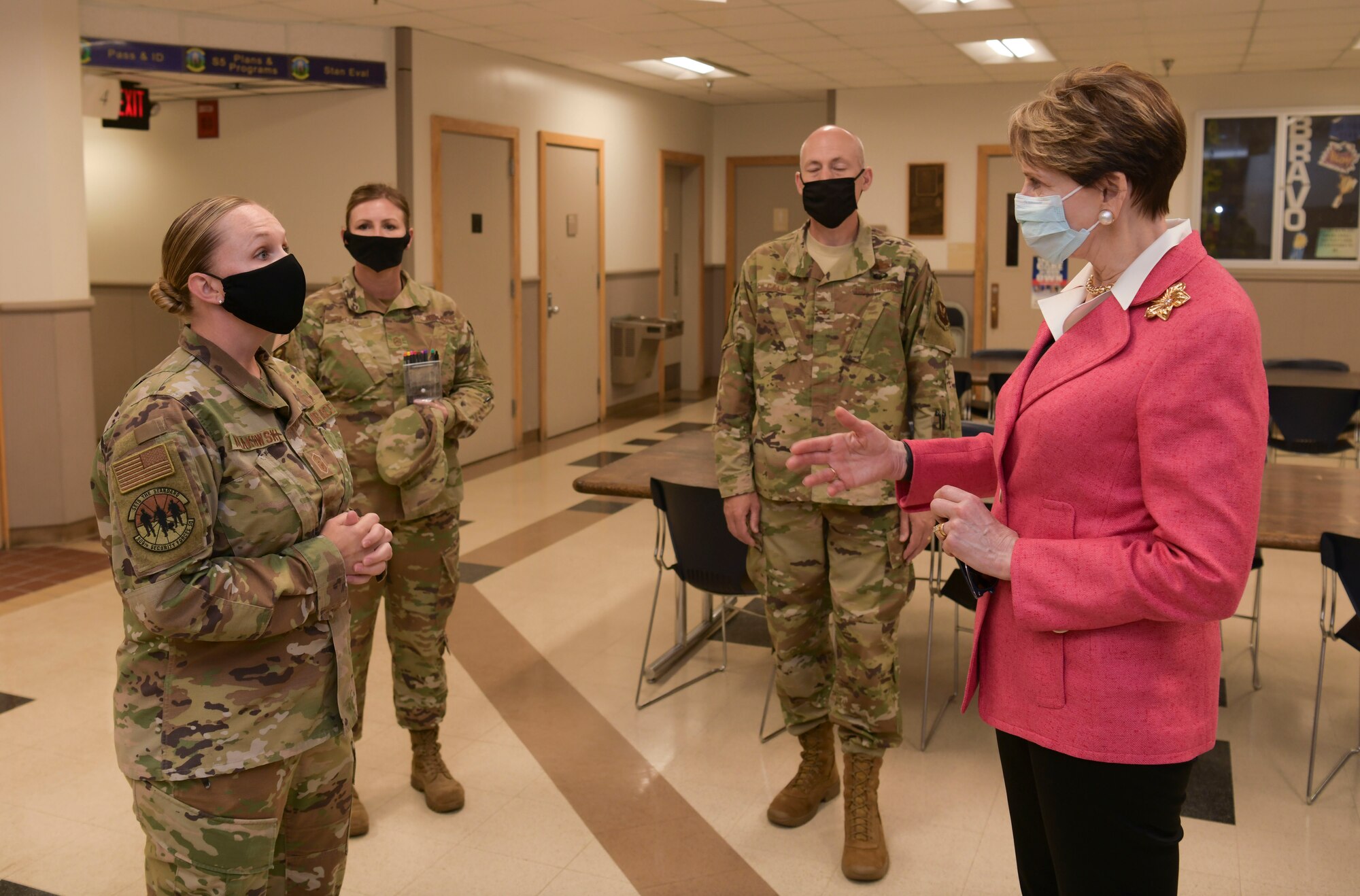 Secretary of the Air Force Barbara Barrett meets with 509th Security Forces Squadron members during a visit at Whiteman Air Force Base, Missouri, June 11, 2020. During her visit, Barrett spoke with base leaders, first responders and maintenance personnel across the installation to learn the B-2 Spirit stealth bomber’s critical role of global deterrence as part of the nuclear triad. (U.S. Air Force photo by Staff Sgt. Dylan Nuckolls)
