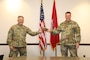 At left, Col. Philip Secrist, the Commander of the U.S. Army Corps of Engineers Transatlantic Middle East District presents the Commander of USACE's Transatlantic Division Col. 
(P) Christopher Beck with an alidade as a token of thanks for his leadership. The alidade has been used for hundreds of years by engineers, and the word is of Middle Eastern origin, making it especially appropriate for our District. Col. Beck took command of the Transatlantic Division in June 2019 and will relinquish command of the Division on 16 June. His next assignment will be the commander of USACE's Southwestern Division.