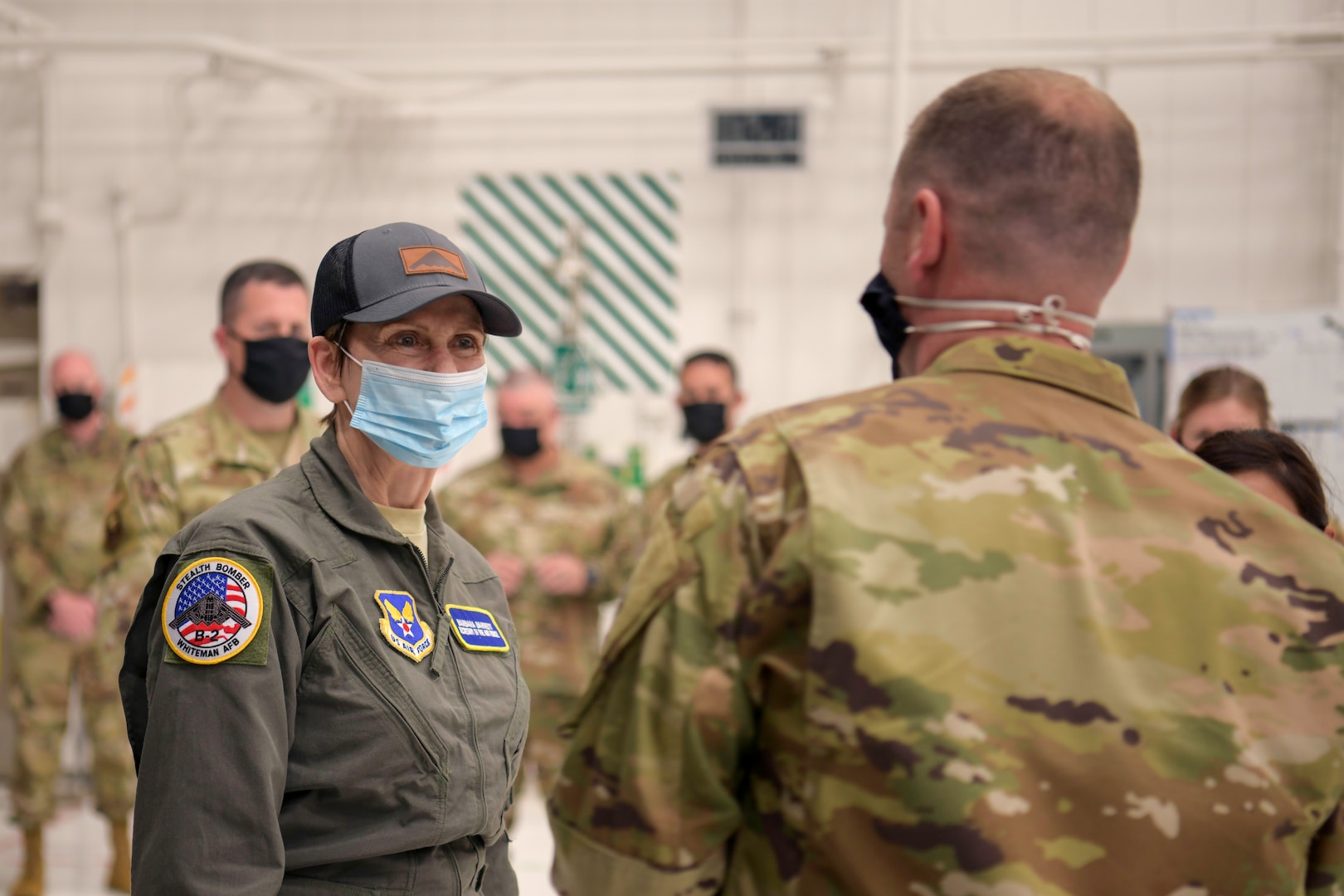 Secretary of the Air Force Barbara Barrett meets with maintenance Airmen during a visit to Whiteman Air Force Base, Missouri, June 11, 2020. During her visit, Barrett spoke with base leaders, first responders and maintenance personnel across the installation to learn what it takes to manage the overall health of the B-2 fleet, improve and sustain unit capabilities. (U.S. Air Force photo by Staff Sgt. Dylan Nuckolls)