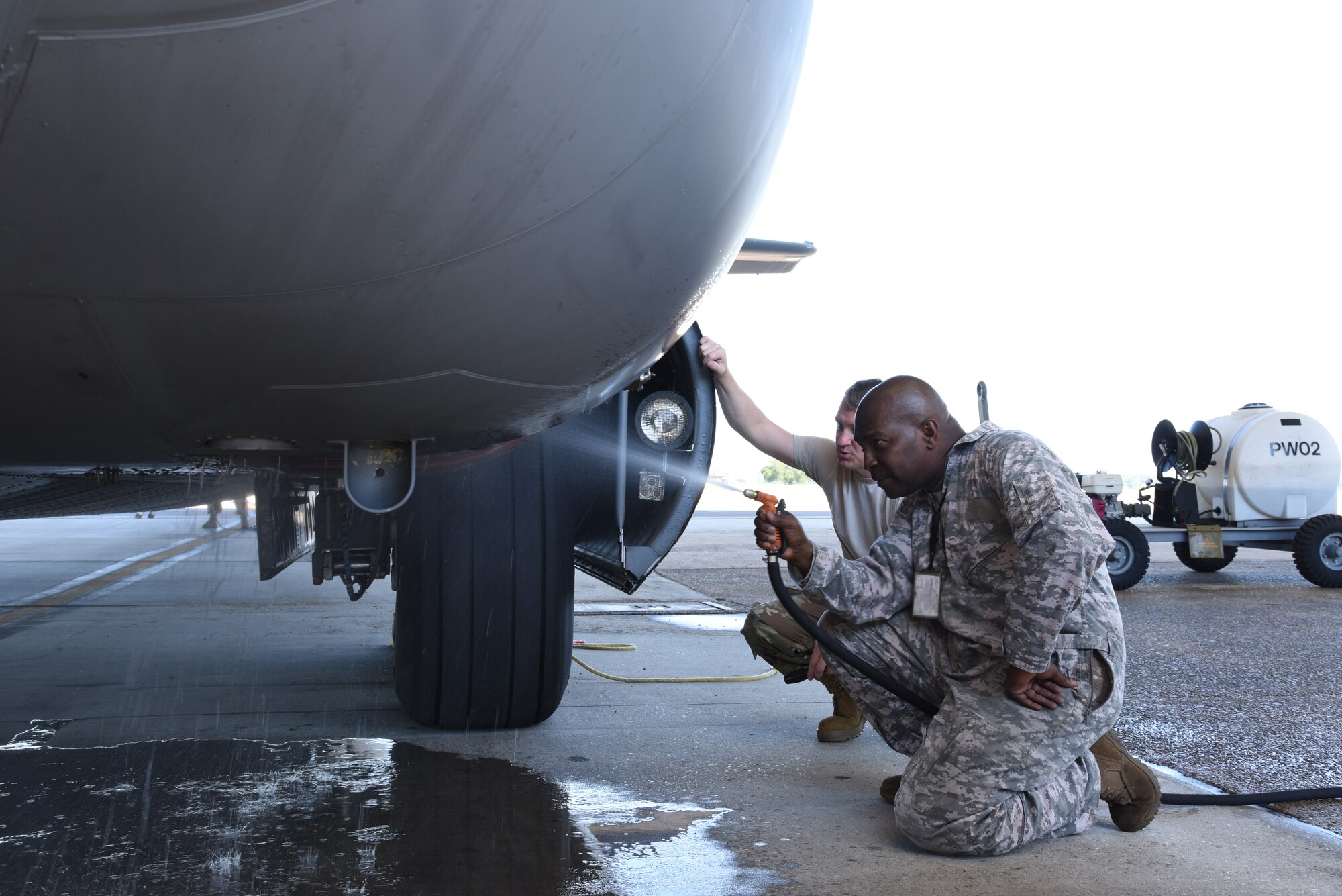Members of the 403rd Maintenance Squadron complete an Engine Compressor Wash on an 815th Airlift Squadron C-130J Super Hercules before the aircraft goes for inspection in the Isochronal Dock for a "C" letter inspection at Keesler Air Force Base, Mississippi May 11, 2020. These inspections or letter checks can range from "A" five days basic check, "B" 18 days and more in depth, to "C" 22 days which is the most intrusive inspection; but are necessary to keep the aircraft maintained. (U.S. Air Force photo by Jessica L. Kendziorek)