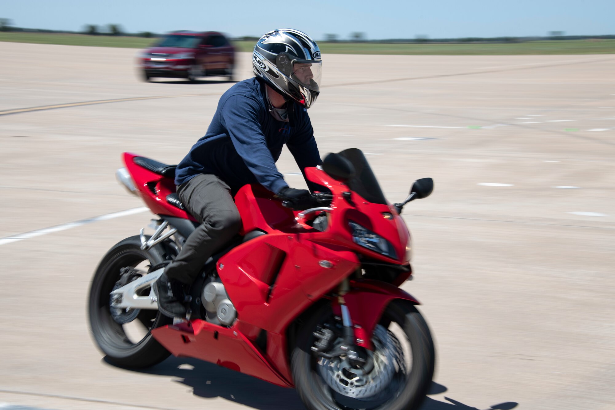 person rides on motor cycle