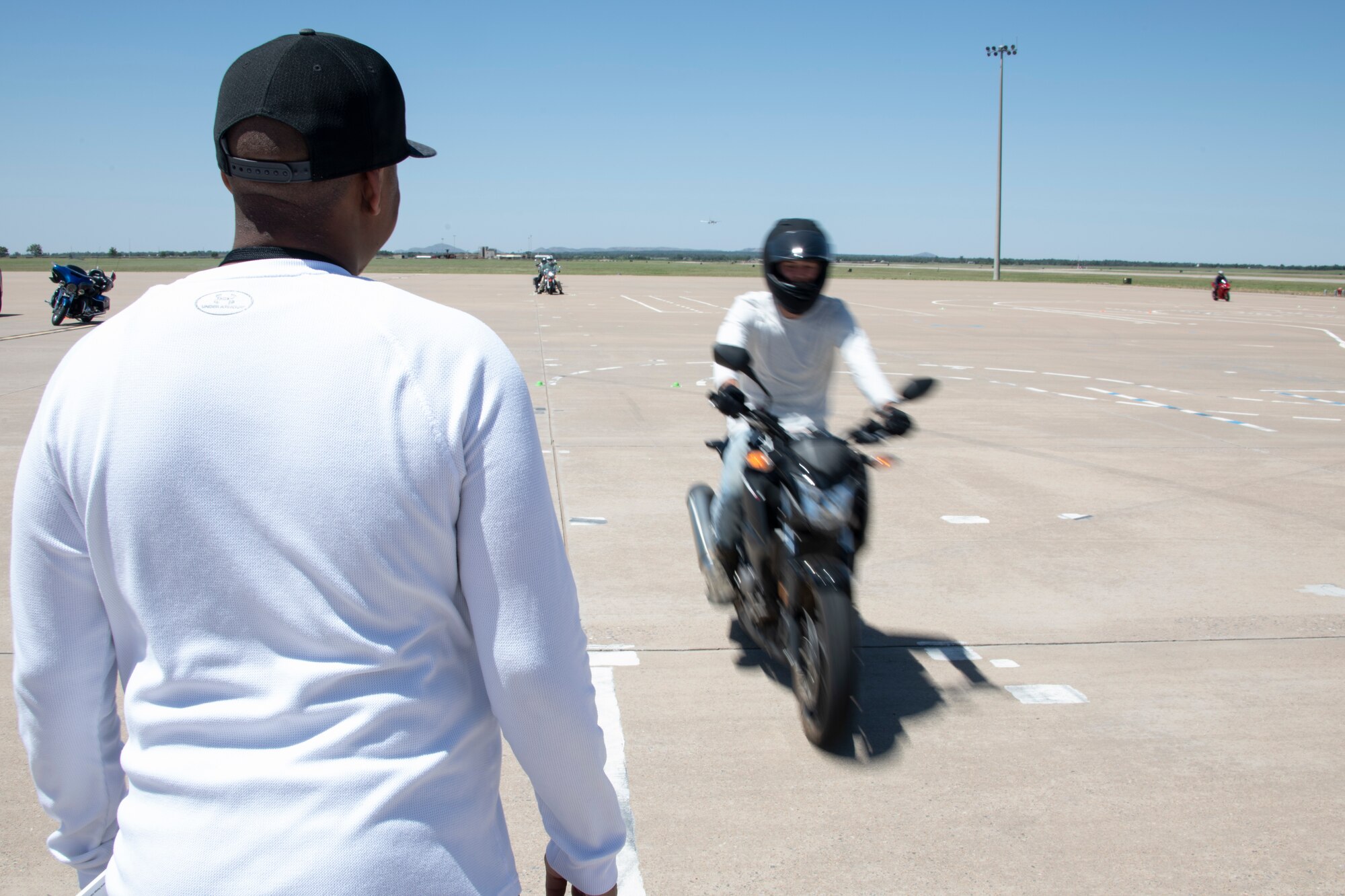 person rides on motor cycle