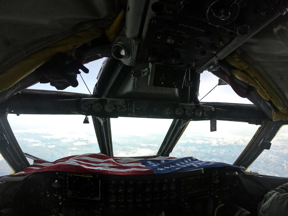 An American flag sits in the cockpit of a B-52 Stratofortress during a North American Aerospace Defense Command (NORAD) mission, June 14, 2020. NORAD routinely conducts intercept training in support of its mission to protect the sovereign airspaces of the United States and Canada. (Courtesy Photo)