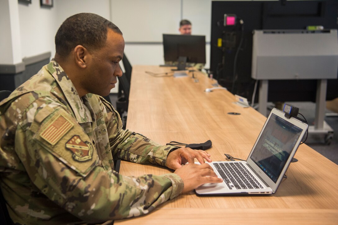 Chief Master Sgt. Terrance Smiley, Kisling Noncommissioned Officer Academy commandant, tests the virtual platforms for the upcoming online professional military education course at Kapaun Air Station, Germany, June, 12, 2020. The Academy cadre devoted three months in professional development training so they could tailor the curriculum to an online format. (U.S. Air Force photo by TSgt Stephen Ocenosak)