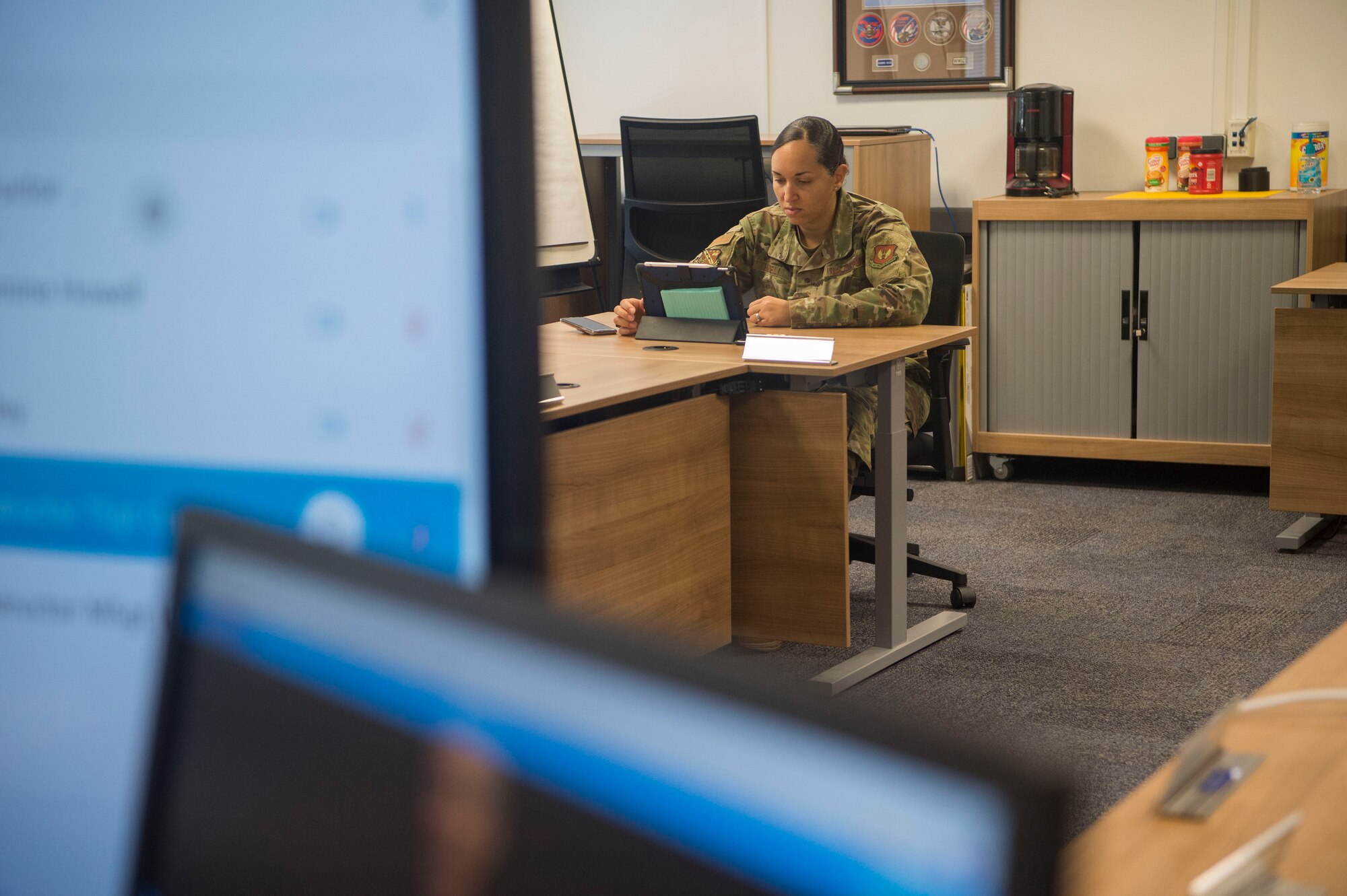 Senior Master Sgt. Jasmine Howell, Kisling Noncommissioned Officer Academy director of education, tests the virtual platforms for the upcoming online professional military education course at Kapaun Air Station, Germany, June 12, 2020. The Academy cadre devoted three months in professional development training so they could tailor the curriculum to an online format. (U.S. Air Force photo by Tech. Sgt. Stephen Ocenosak)