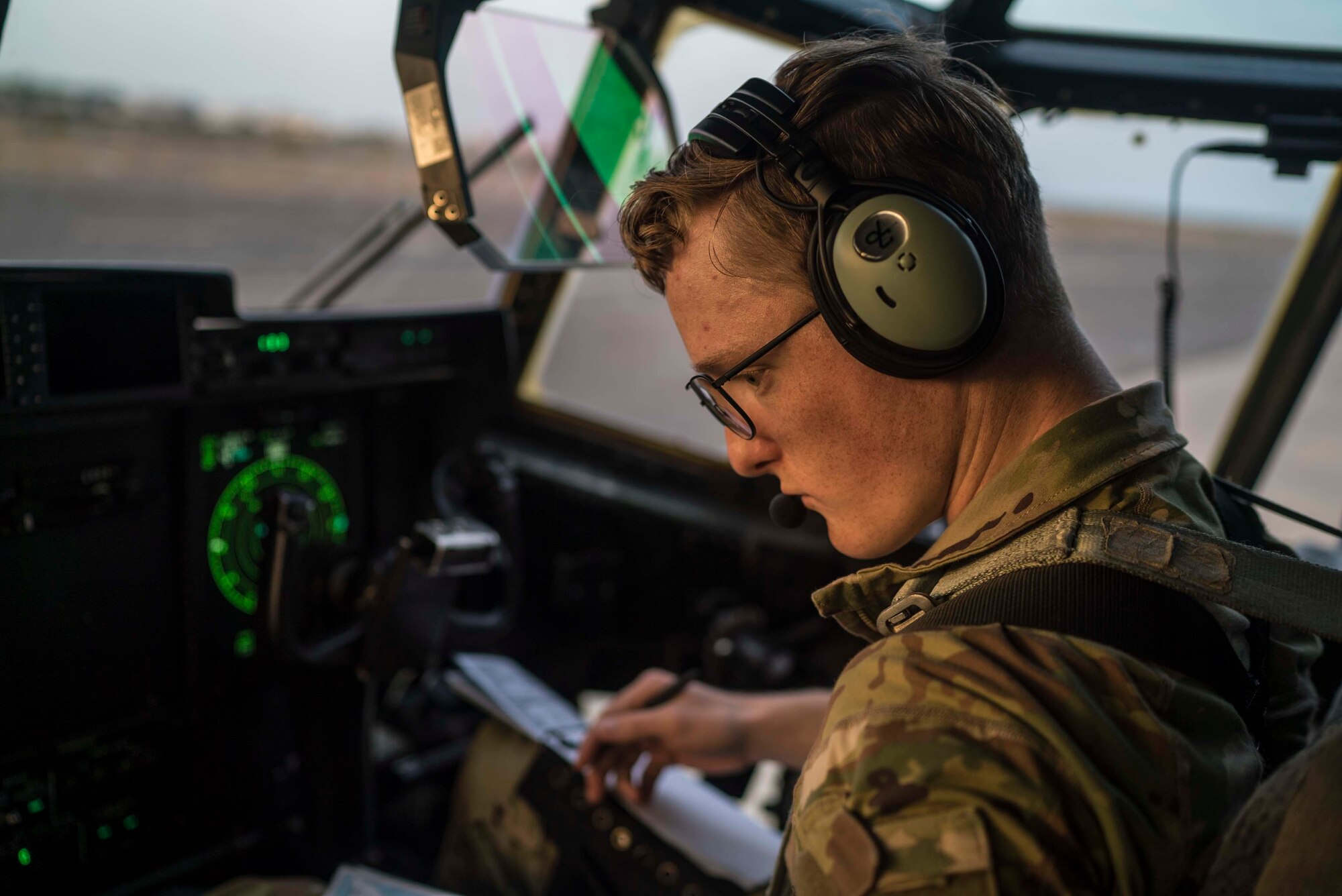 U.S. Air Force 1st Lt. Jonathan Streckfuss, 75th Expeditionary Airlift Squadron (EAS), C-130J Super Hercules pilot, performs preflight duties before takeoff at Camp Lemonnier, Djibouti, June 6, 2020. The 75th EAS provides strategic Airlift capabilities across the Combined Joint Task Force - Horn of Africa (CJTF-HOA) area of responsibility. (U.S. Air Force photo by Staff Sgt. Shawn White)