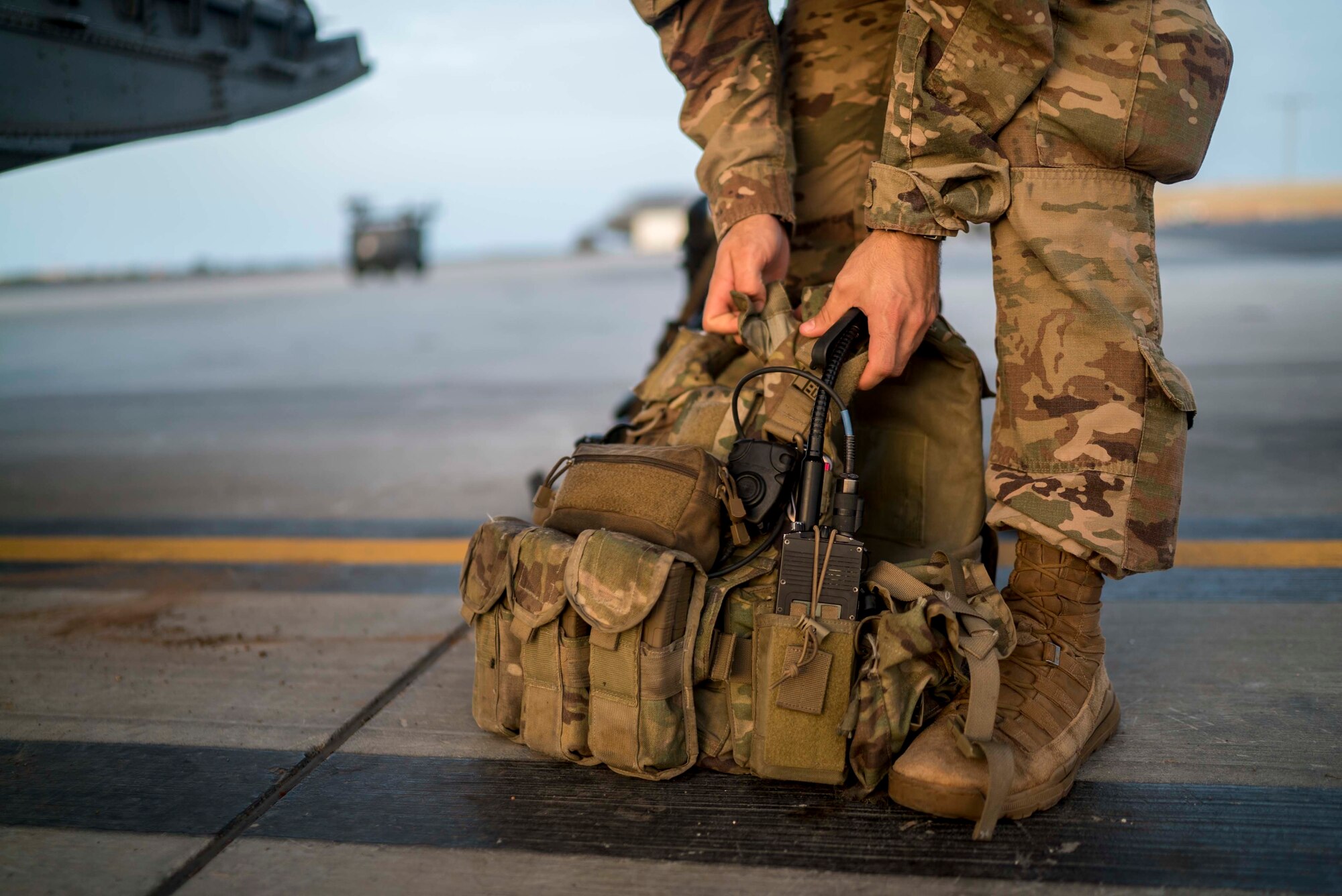 A U.S. Army soldier assigned to Site Security Team Task Force Guardian, 1st Battalion, 186th Infantry Brigade Combat Team, prepares to board a C-130J Super Hercules from the 75th Expeditionary Airlift Squadron (EAS) at Camp Lemonnier, Djibouti, June 6, 2020. The 75th EAS provides strategic Airlift capabilities across the Combined Joint Task Force - Horn of Africa (CJTF-HOA) area of responsibility. (U.S. Air Force photo by Staff Sgt. Shawn White)