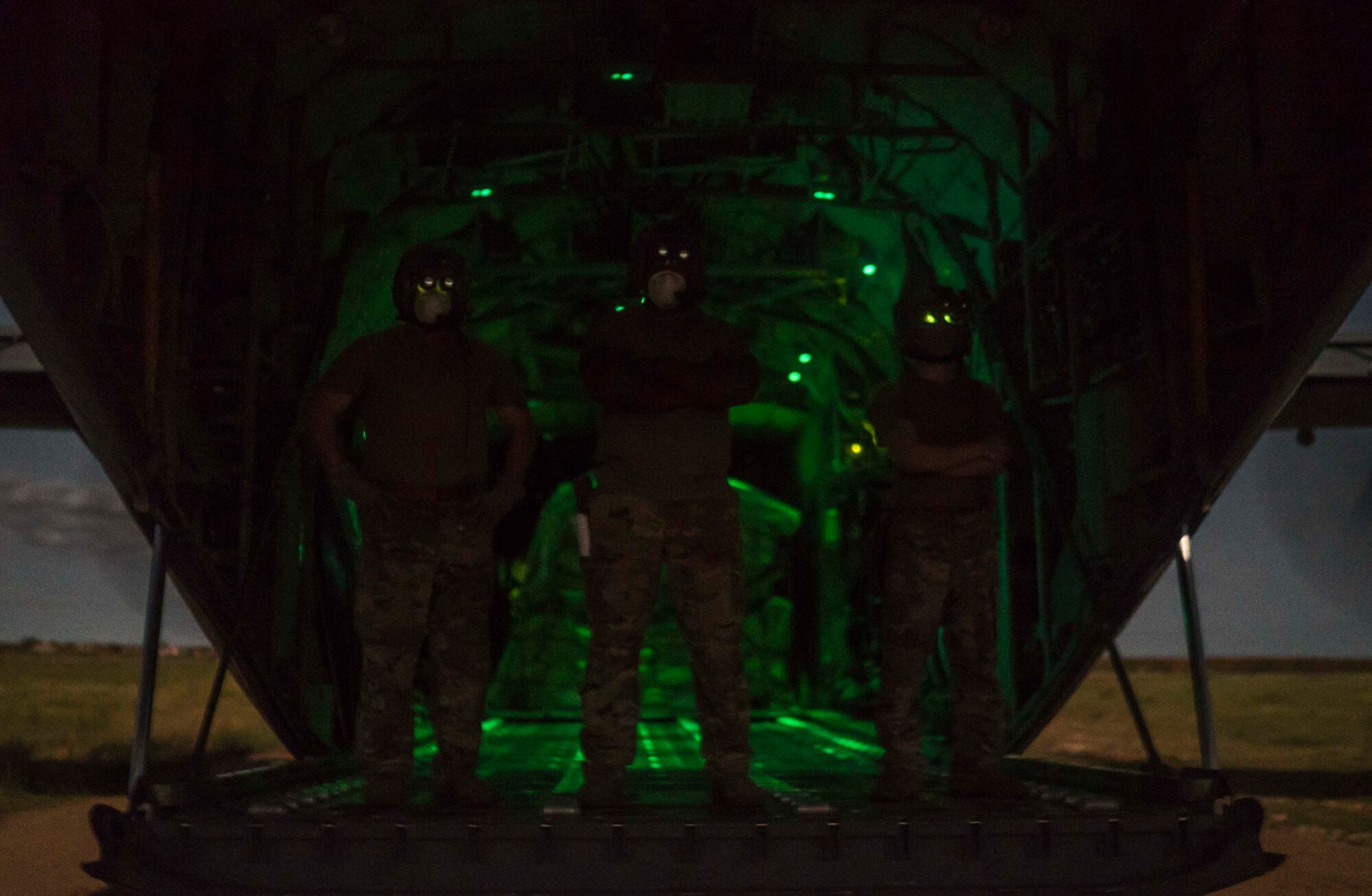 U.S. Air Force Airmen with the 75th Expeditionary Airlift Squadron (EAS) prepare to load cargo onto a C-130J Super Hercules Somalia, June 6, 2020. The 75th EAS provides strategic Airlift capabilities across the Combined Joint Task Force - Horn of Africa (CJTF-HOA) area of responsibility. (U.S. Air Force photo by Staff Sgt. Shawn White)