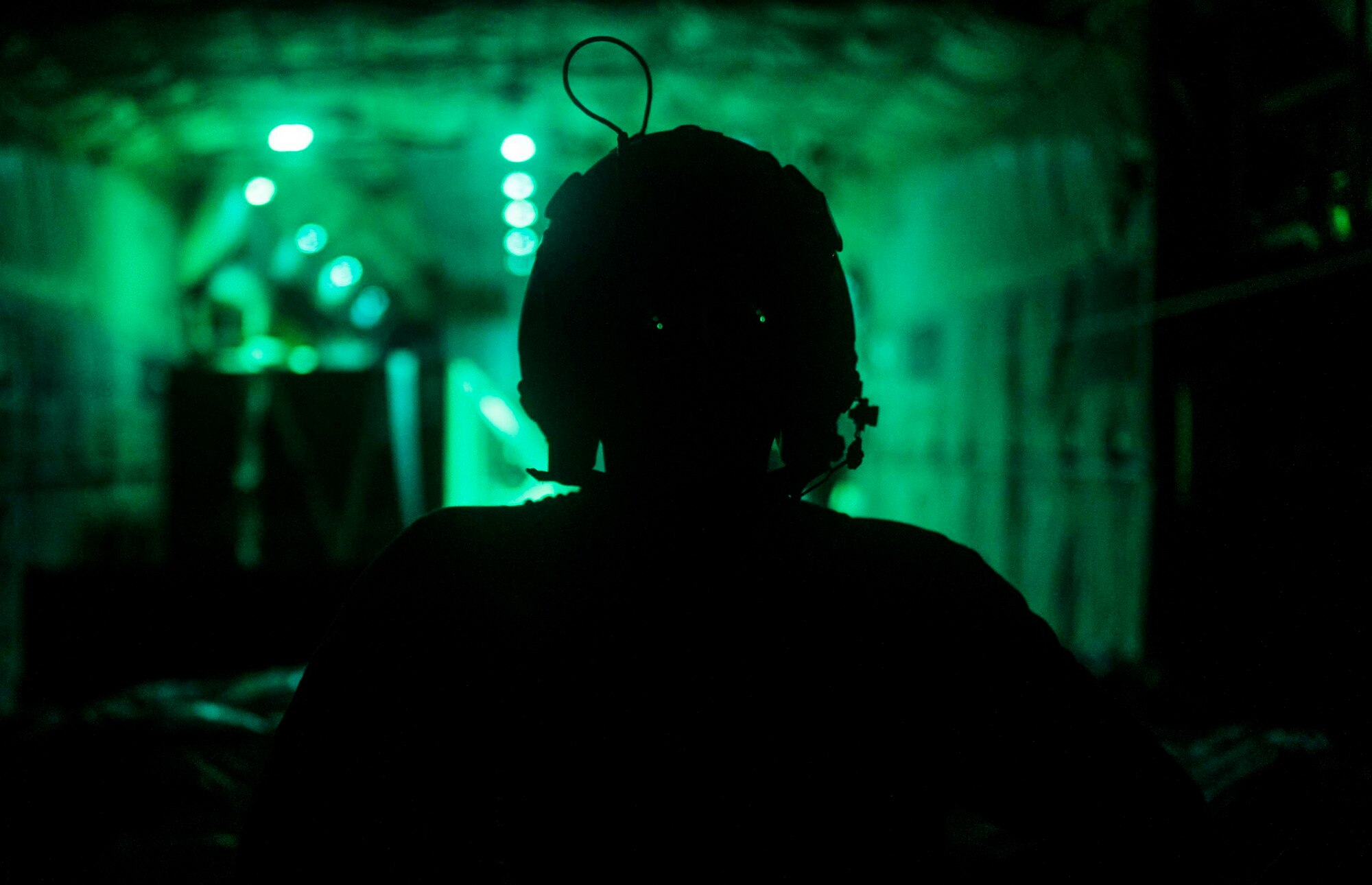 A U.S. Air Force loadmaster from the 75th Expeditionary Airlift Squadron (EAS) prepares to load cargo onto a C-130J Super Hercules in Somalia, June 10, 2020. The 75th EAS provides strategic airlift capabilities across the Combined Joint Task Force - Horn of Africa (CJTF-HOA) area of responsibility. (U.S. Air Force photo by Staff Sgt. Shawn White)