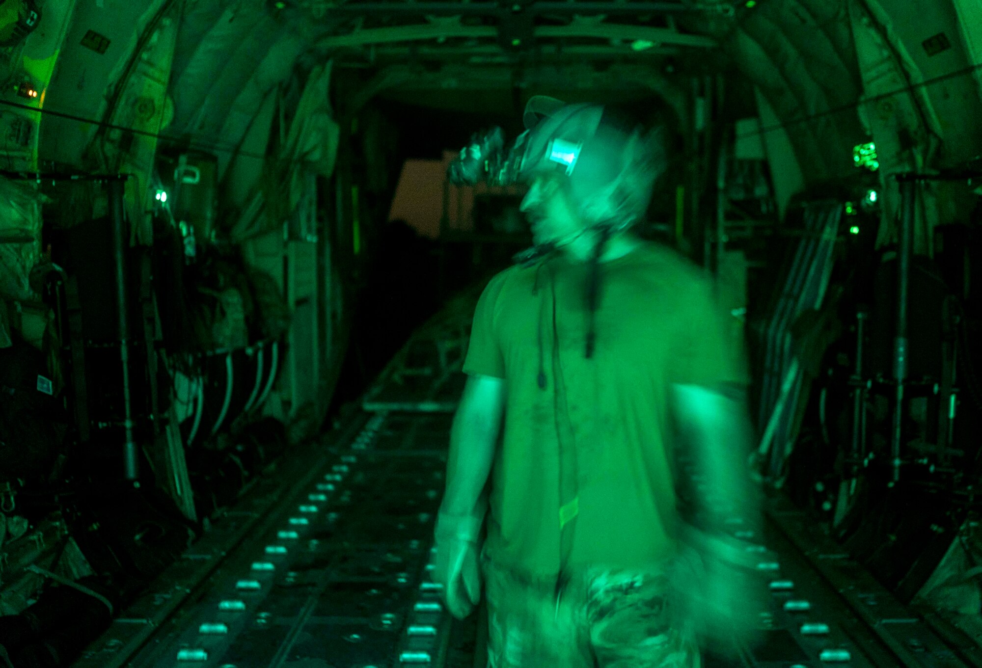 Senior Master Sgt. Jerimiah Yurick, 75th Expeditionary Airlift Squadron (EAS) loadmaster, loads cargo onto a C-130J Super Hercules in Somalia, June 10, 2020. The 75th EAS provides strategic airlift capabilities across the Combined Joint Task Force - Horn of Africa (CJTF-HOA) area of responsibility. (U.S. Air Force photo by Staff Sgt. Shawn White)
